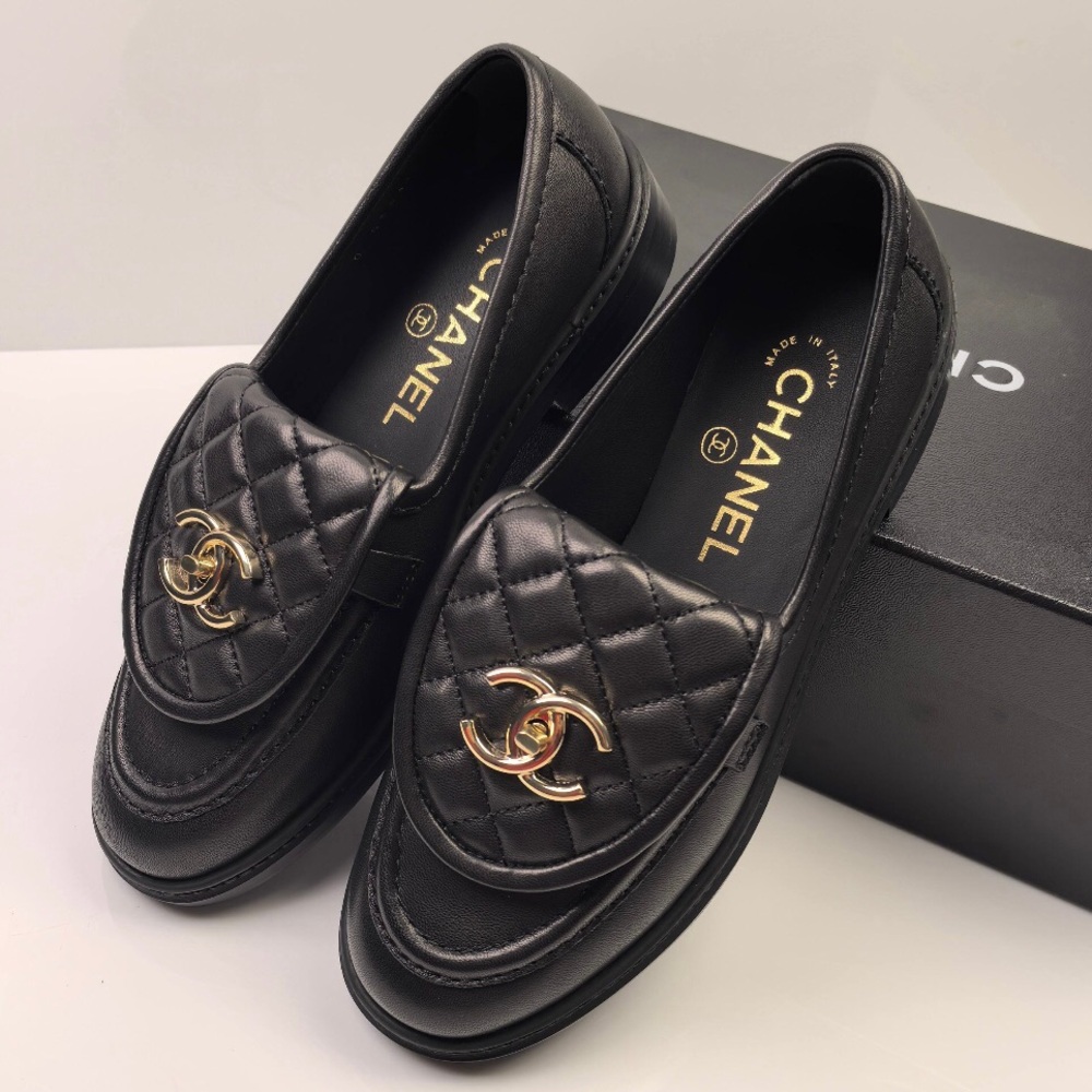 CHANEL Black Quilted Leather Loafers with Gold CC Emblem